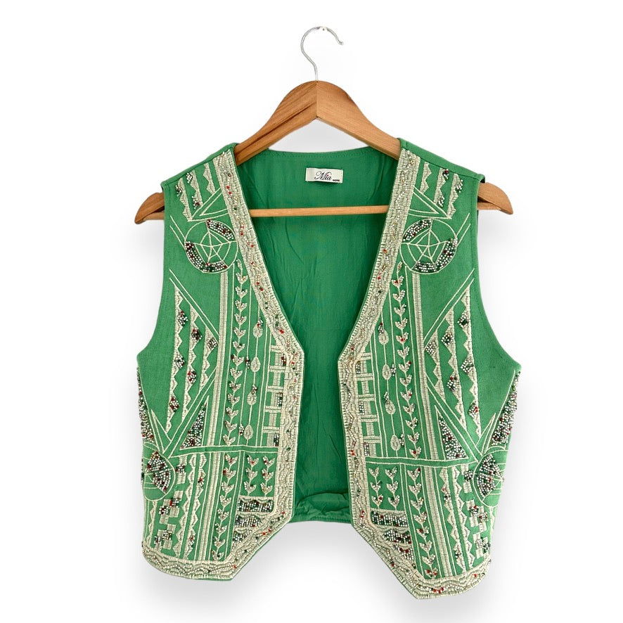 colete verde missangas frente