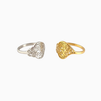 Anéis GRINE em aço inoxidável com design de Coração de Viana em acabamentos dourado e prateado