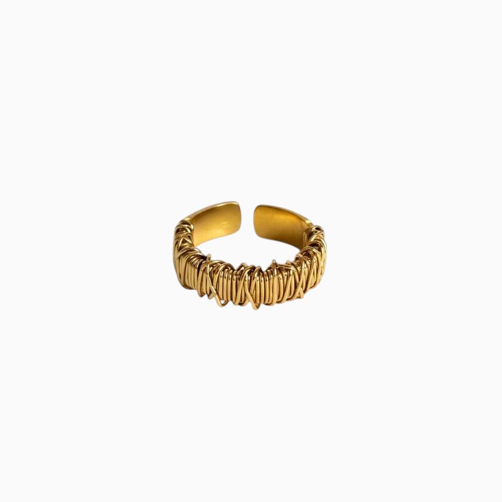Anel GRINE ajustável em aço inoxidável dourado com design de fios entrelaçados e acabamento sofisticado.