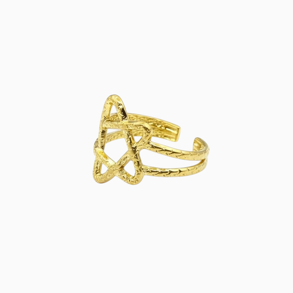 Anel GRINE em aço inoxidável dourado com design de estrela entrelaçada e acabamento texturizado.