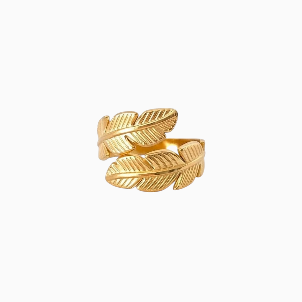 Anel GRINE ajustável em aço inoxidável dourado com design delicado de folhas entrelaçadas.