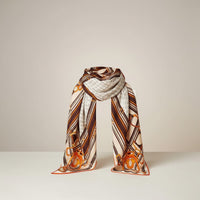 GRINE beige polyester scarf with equestrian bit print and striped border. 195cm x 90cm.