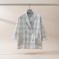 GRINE beige linen plaid double-breasted blazer with wide lapels and decorative pocket details.