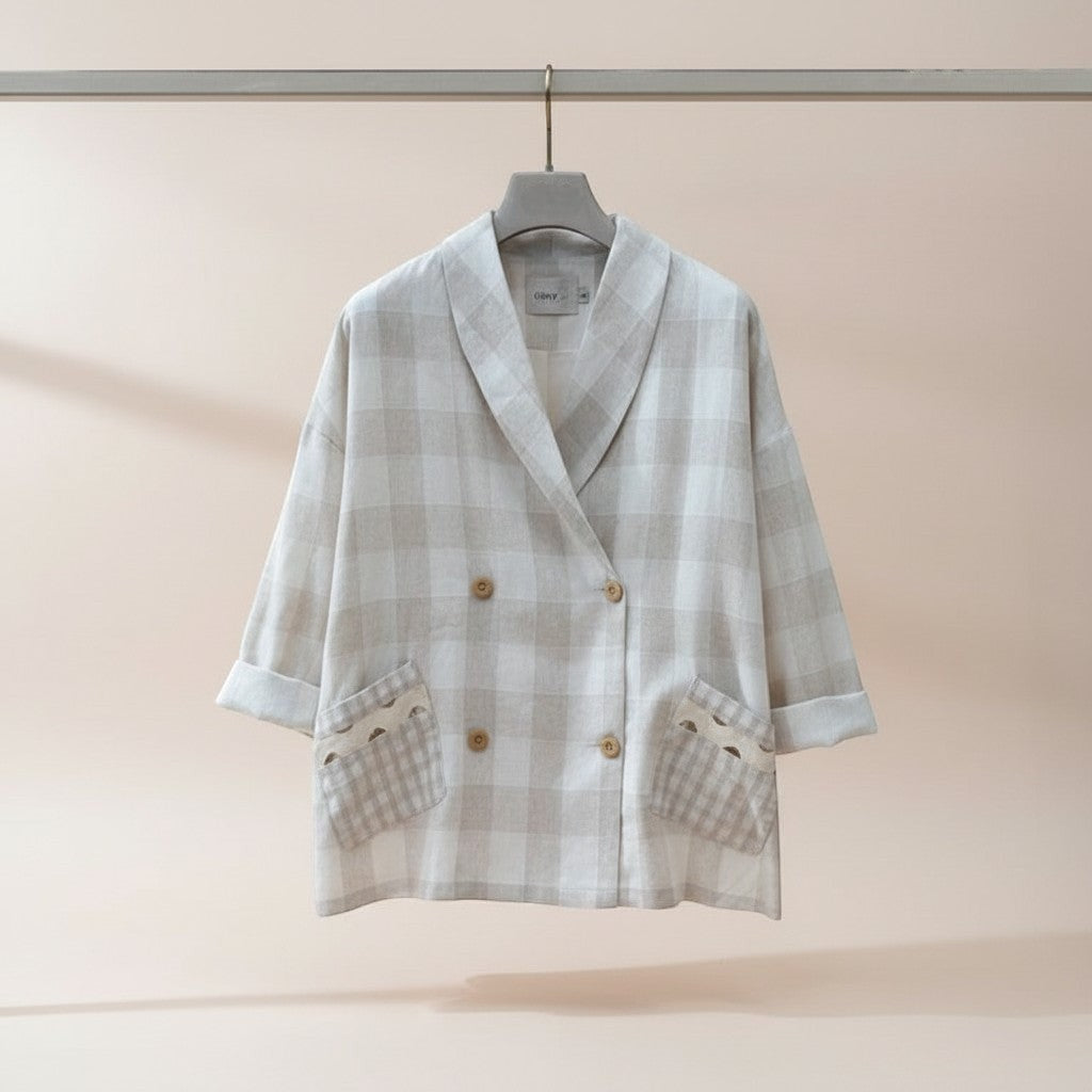 GRINE beige linen plaid double-breasted blazer with wide lapels and decorative pocket details.