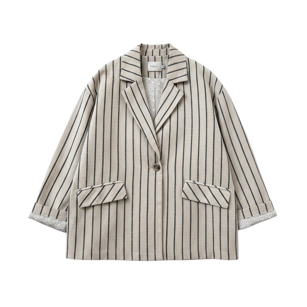 GRINE oversized beige linen blend blazer with black vertical stripes and button closure. Features two front pockets and cuffed sleeves.