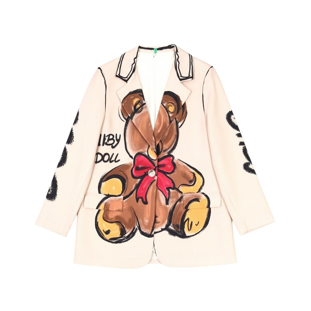 GRINE beige oversized blazer with a central teddy bear print and red bow detail. Features wide lapels and a casual-chic style.