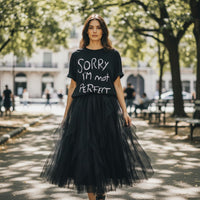 GRINE black 100% cotton t-shirt with round neck and short sleeves, featuring white "Sorry I'm Not Perfect" graphic print.
