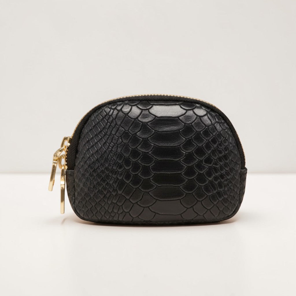 GRINE black leather coin purse with crocodile texture and zip closure.