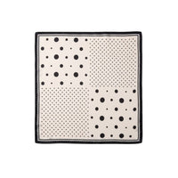 GRINE satin square scarf with black and white polka dots and black border. Versatile accessory.