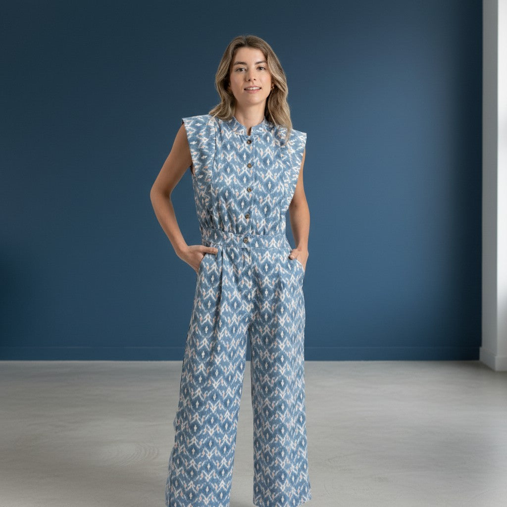 GRINE blue ikat print wide-leg jumpsuit with button front, elastic waist, and side pockets.
