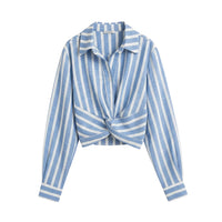 GRINE blue and white striped cropped shirt with a twisted front detail and collared neckline. Lightweight fabric.