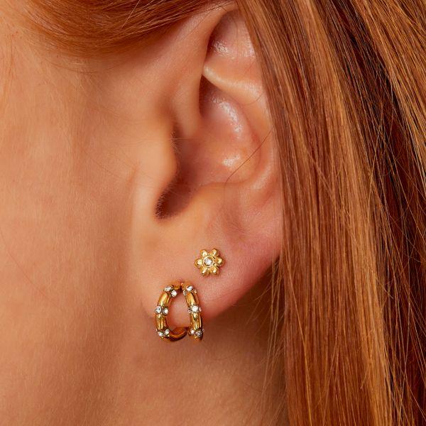Brincos GRINE em forma de flor em aço inoxidável dourado com zirconia central delicada na orelha
