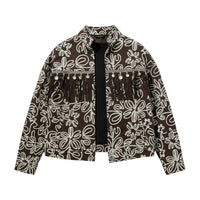 GRINE Oaxaca denim jacket in brown with white floral print, featuring embroidered details, fringe with shells, and silver embellishments.