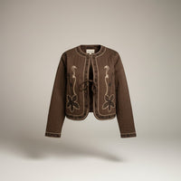GRINE brown quilted cropped jacket with embroidered details and tie front closure.