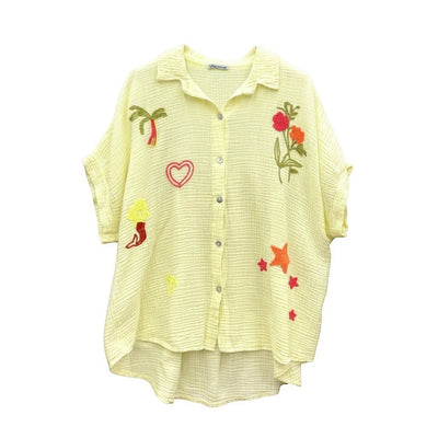 GRINE Camisa amarela de algodão com bordados de palmeira, coração, sereia e estrelas. Corte oversize.
