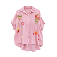 GRINE camisa rosa de algodão com bordados de palmeira, sereia, coração e flores. Corte oversize.