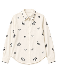 Camisa GRINE branca em algodão com delicados bordados florais pretos e gola com acabamento festonado