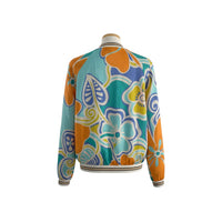 GRINE bomber casaco estampado em viscose com padrão floral colorido em azul, verde e laranja. Gola, punhos e cós com detalhes dourados.