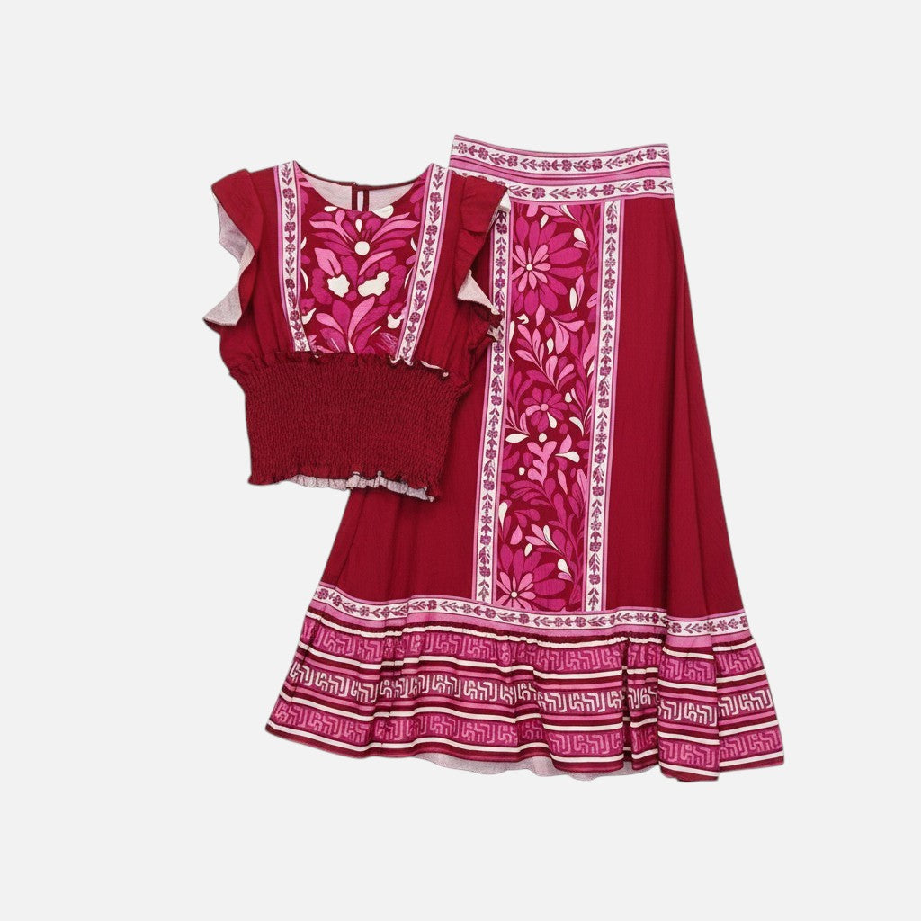 Conjunto GRINE de saia midi e top em tom bordô com padrão floral e detalhes étnicos em estilo boho chic