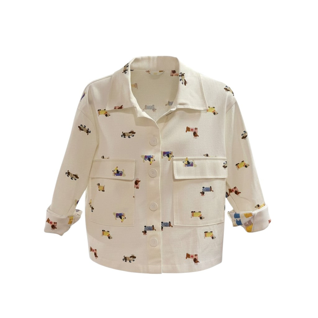 GRINE cream cotton denim jacket with a playful dog print, featuring a collar, button-down front, and two chest pockets.