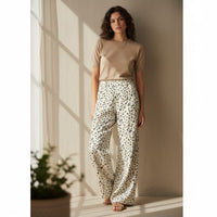 GRINE mustard yellow and green floral print straight leg jeans with adjustable elastic waist and pockets.