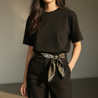 GRINE green animal print satin square scarf, 70cm x 70cm, 100% polyester, tied at the waist.