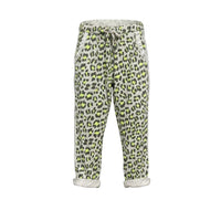 GRINE leopard print jogger pants with lime green accents, elastic waist, and cuffed hem. Cotton blend.