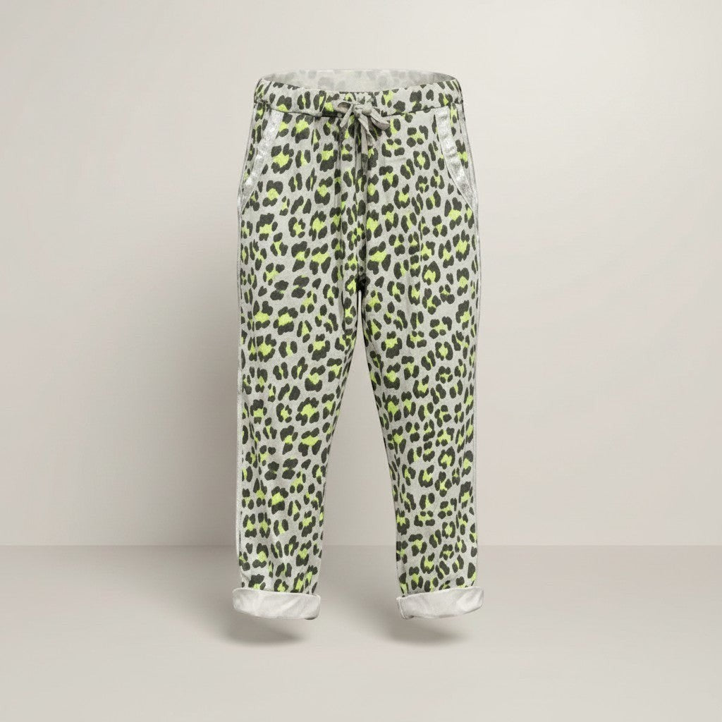 GRINE grey jogger pants with a neon green and black leopard print, elastic waistband, drawstring, and cuffed hems.