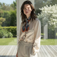 GRINE navy blue and white paisley print satin square scarf with burnt orange border. 70cm x 70cm.