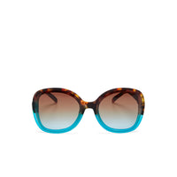 Óculos de sol GRINE OKKIA ANNA com armação tartaruga e azul em acetato e lentes castanhas degradé polarizadas.