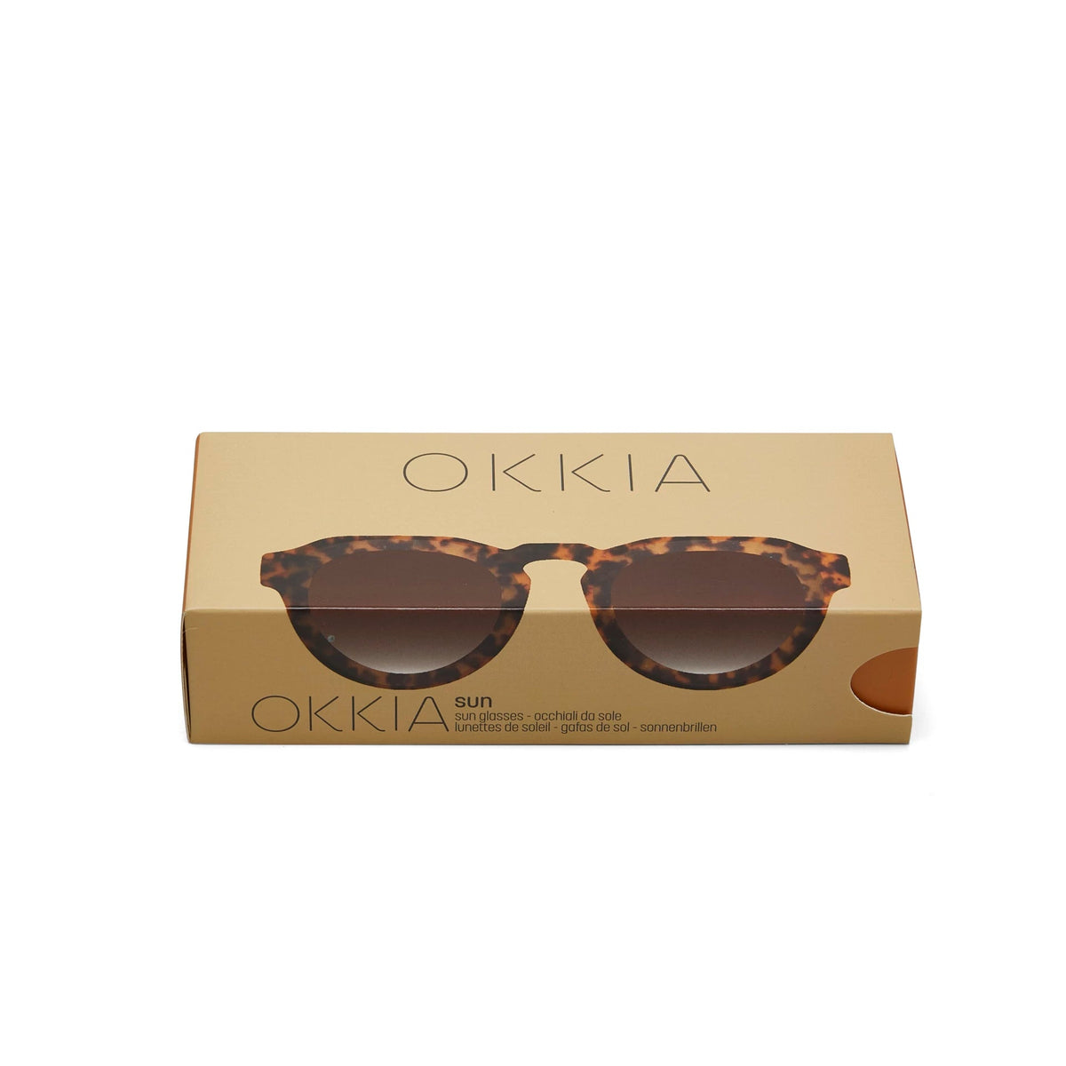 Embalagem de óculos de sol GRINE OKKIA ZENO com padrão Classic Havana e lentes castanhas em caixa de cartão bege