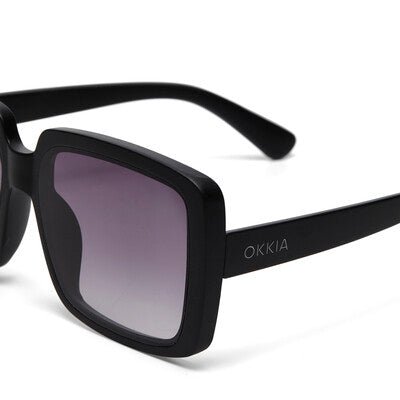 Óculos de sol GRINE OKKIA Alessia pretos com armação em acetato e lentes degradé polarizadas com proteção UV400