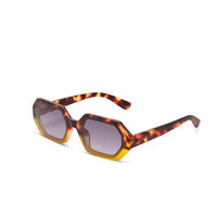Óculos de sol GRINE OKKIA ANDREA com armação em acetato padrão tartaruga e amarelo e lentes castanhas degradé