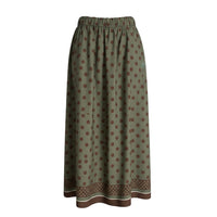 GRINE olive green midi skirt with brown polka dots and a decorative border at the hem. Elasticated waistband for comfort.
