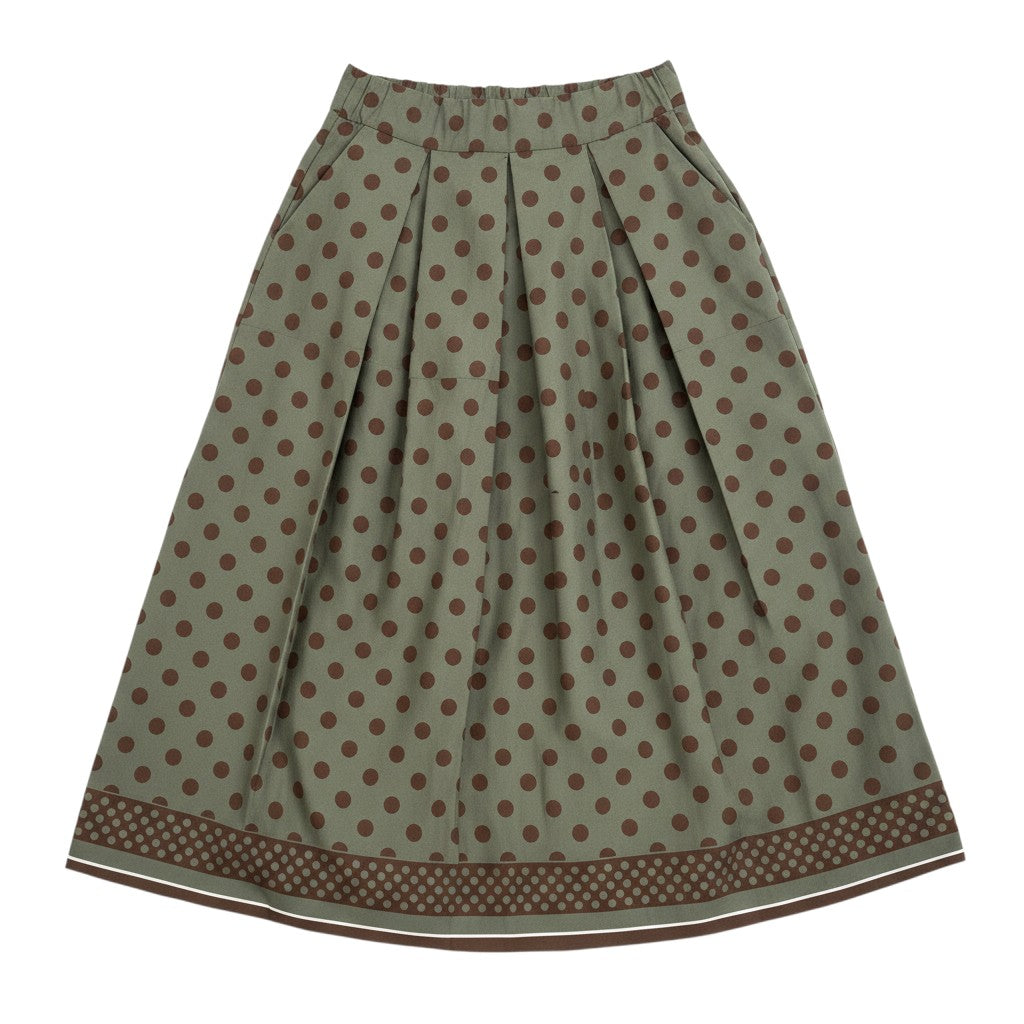 GRINE Marie midi skirt in olive green with brown polka dots and a tiered hem. Features a flattering A-line cut and elasticated waistband.
