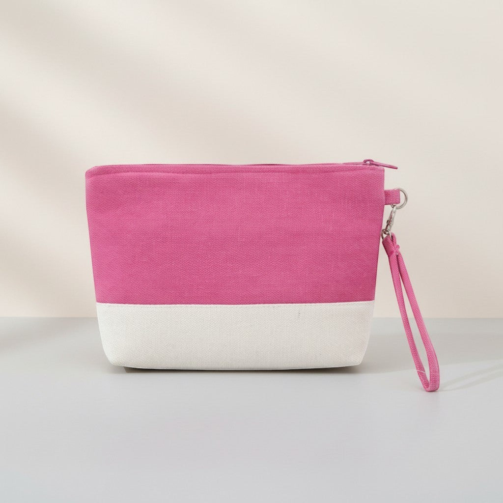 GRINE pink and cream canvas beach necessaire with removable wrist strap. Perfect for organizing essentials.