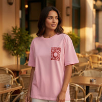 GRINE pink 100% cotton t-shirt with round neck and graphic 'Le Soleil' sun print on the front.