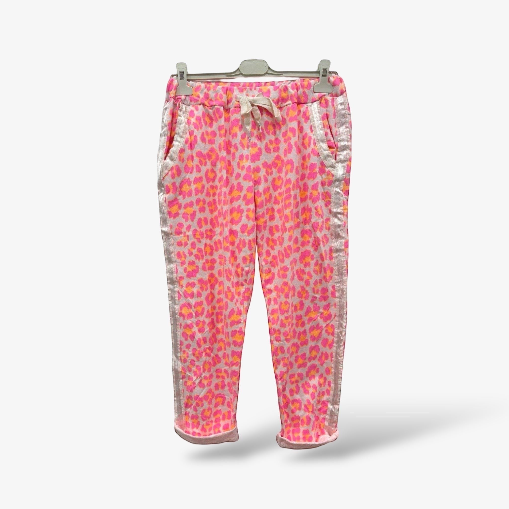 GRINE pink and orange leopard print jogger pants with elastic waistband and side stripes. Cotton blend.