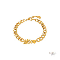 Pulseira GRINE de malha grossa dourada em aço inoxidável com a palavra Mãe e um pequeno coração pendente