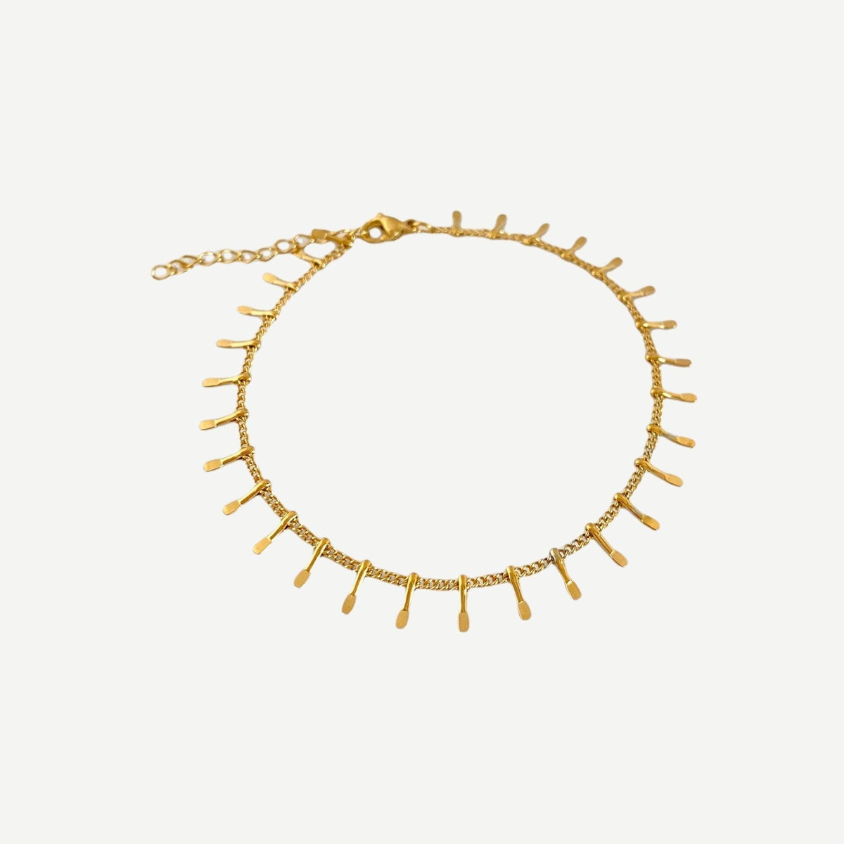 Pulseira GRINE de corrente fina em aço inoxidável dourado com detalhes pendentes ajustável