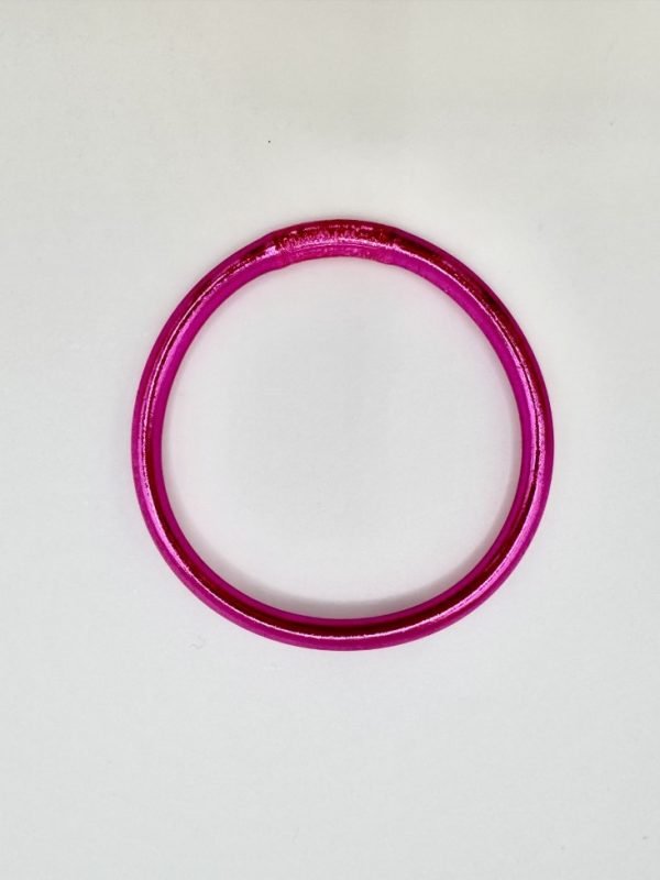 Pulseira GRINE artesanal budista em tom fúcsia brilhante com folha de ouro, flexível e impermeável.