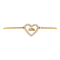 Pulseira GRINE ajustável em aço inoxidável dourado com pendente de coração em madrepérola e a palavra Mãe gravada.