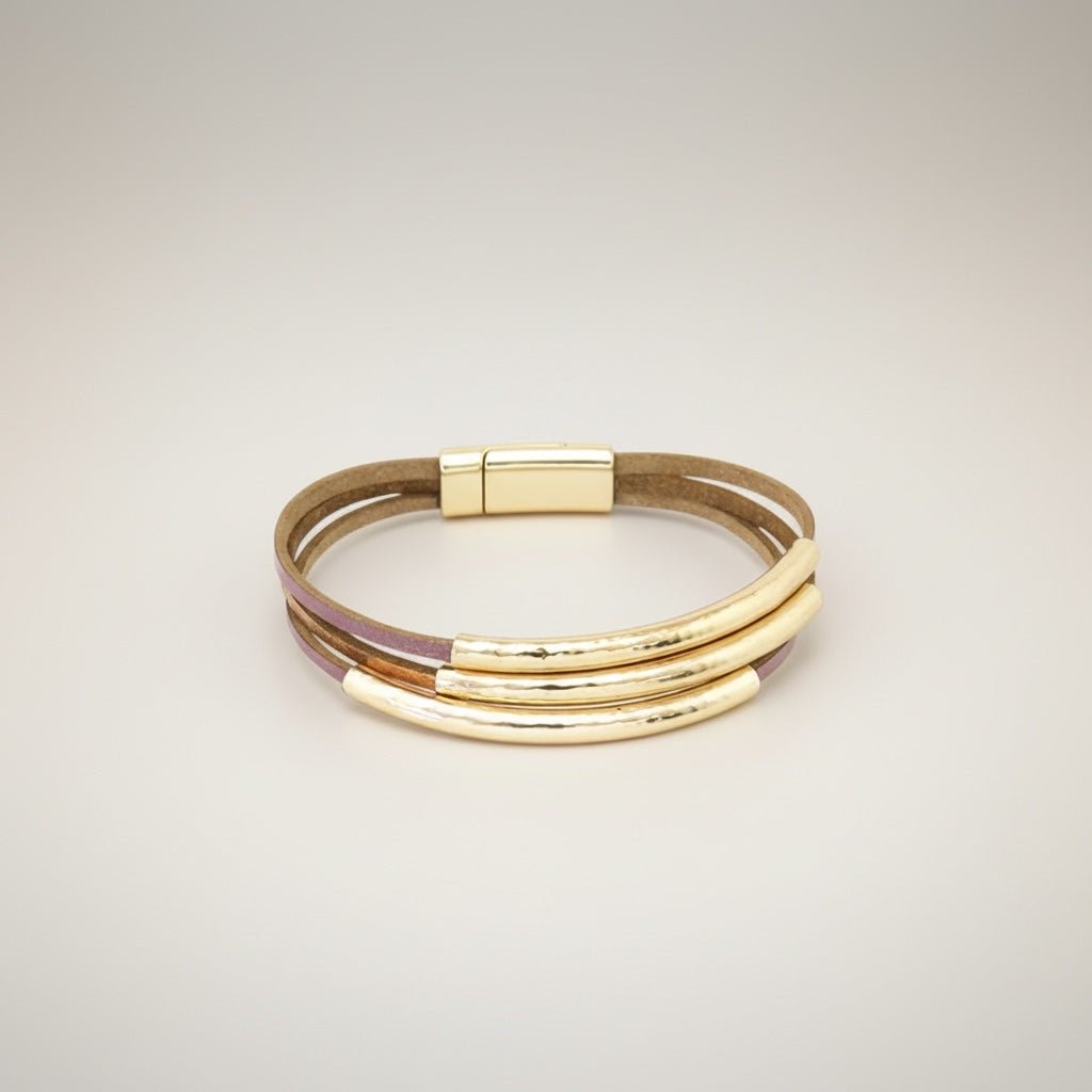 Pulseira Funky GRINE em pele sintética rosa e bronze com tubos metálicos dourados e fecho magnético hipoalergénico.