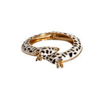 Pulseira rígida GRINE com padrão de girafa em esmalte preto e branco e detalhes em cobre com abertura de mola