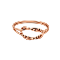 Pulseira Infinity GRINE flexível em tom dourado com conector de cobre em forma de nó, símbolo de amor e sorte.