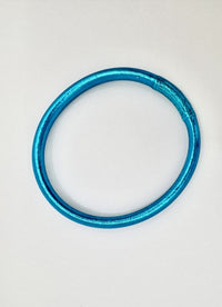 Pulseira GRINE lisa em azul brilhante com folha de ouro no interior, amuleto budista flexível e impermeável