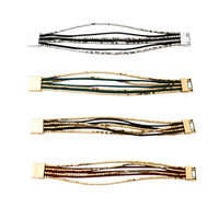 Pulseira Phuket GRINE com cordões de pele e contas metálicas, disponível em várias cores com fecho magnético.