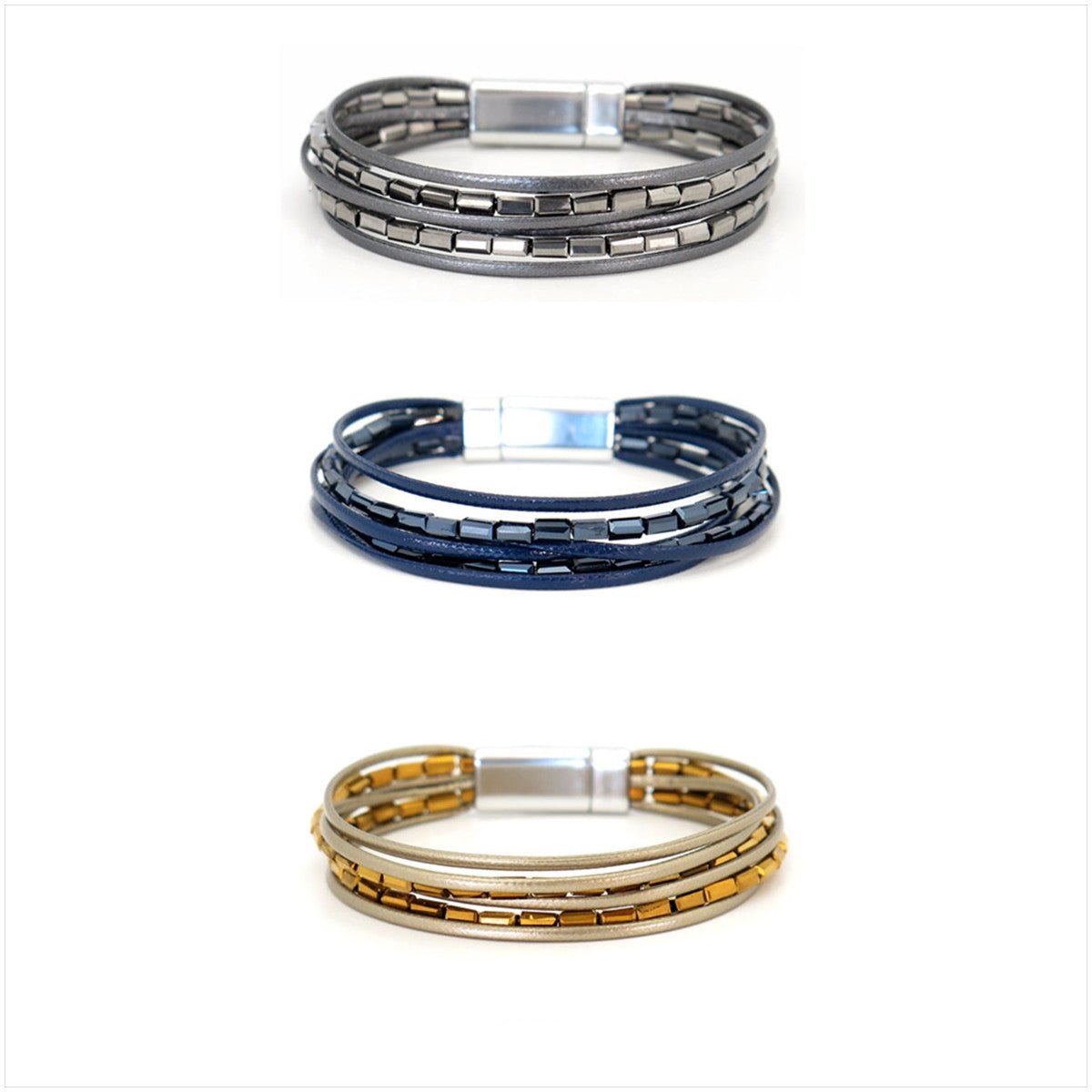 Pulseira Tami GRINE em pele sintética com cristais e fecho magnético, disponível em cinzento, azul e dourado.