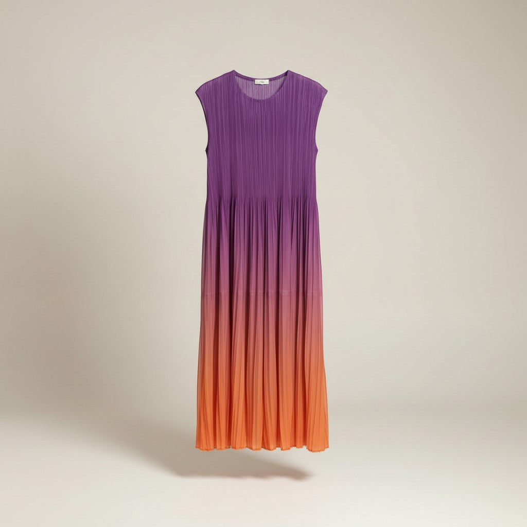 GRINE purple to orange ombre pleated maxi dress with cap sleeves. Lightweight, flowing fabric.