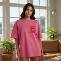 GRINE T-Shirt Le Soleil rosa em algodão com estampa gráfica de sol e texto "LE SOLEIL" discreta na frente.